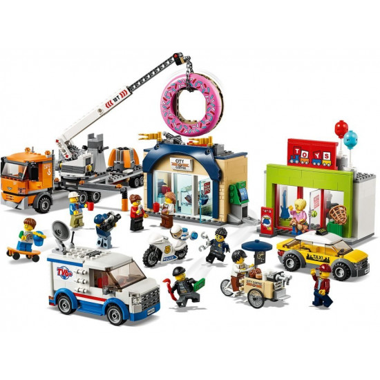 Конструктор LEGO City Відкриття магазину пончиків (60233) Конструктор LEGO City Відкриття магазину пончиків (60233)