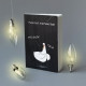 Notepad at the dot with Goose Learning light