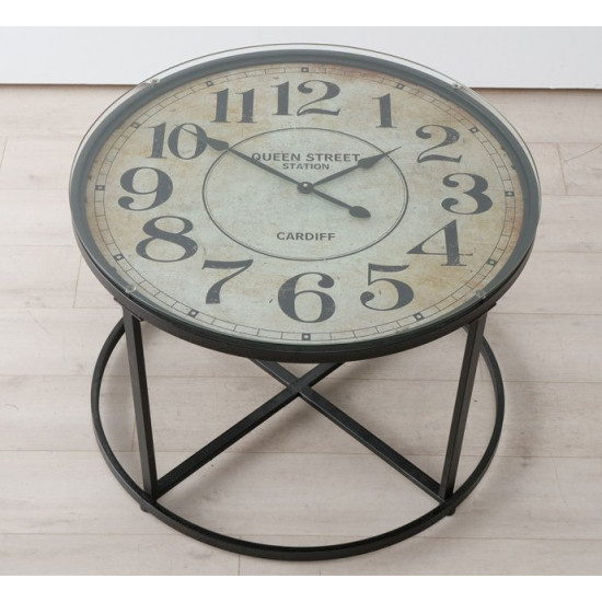 Black metal coffee table with a clock on the tabletop Present Antique Black metal coffee table with a clock on the tabletop Present Antique