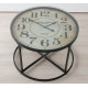 Black metal coffee table with a clock on the tabletop Present Antique Black metal coffee table with a clock on the tabletop Present Antique