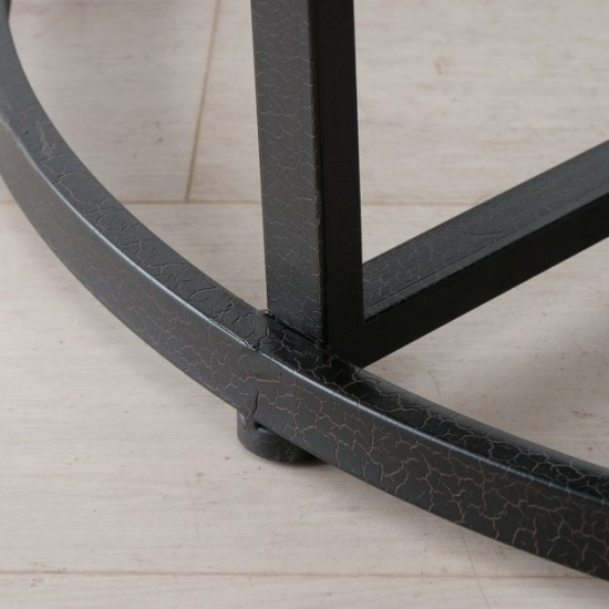 Black metal coffee table with a clock on the tabletop Present Antique Black metal coffee table with a clock on the tabletop Present Antique
