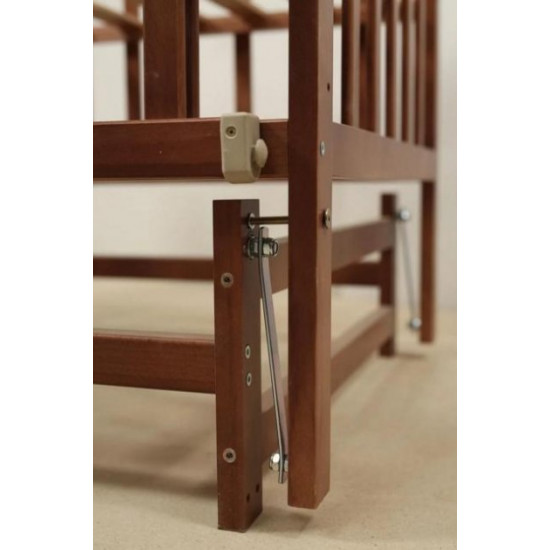 Children's bed crib GOYDA VALERIA with a pendulum mechanism and a folding side panel (600*1200mm), wenge Children's bed crib GOYDA VALERIA with a pendulum mechanism and a folding side panel (600*1200mm), wenge
