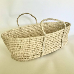 Adamex wicker cradle made from dried corn leaves