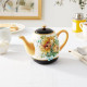 Teapot for tea with a pattern of flowers Teapot for tea with a pattern of flowers