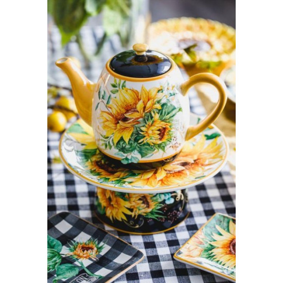Teapot for tea with a pattern of flowers Teapot for tea with a pattern of flowers
